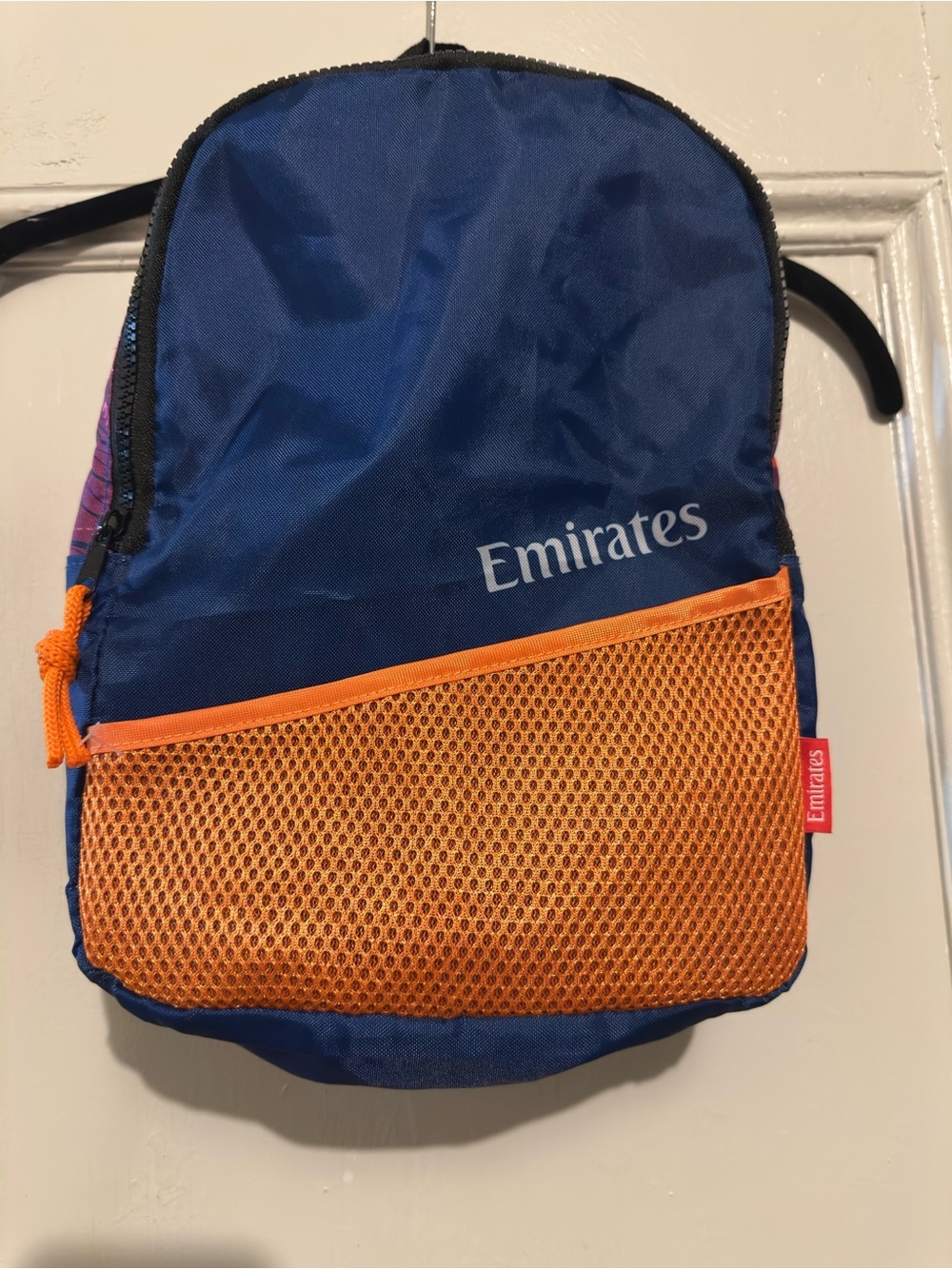 Like New Emirates Blue and Orange Kid’s Backpack. 13.5”L x 11.5”W.